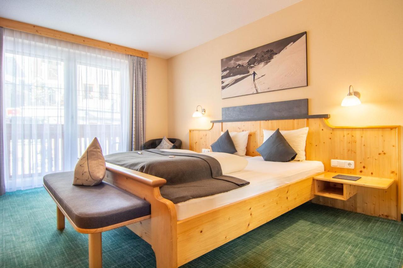 Hotel Garni Alpenhof Ишгль Экстерьер фото