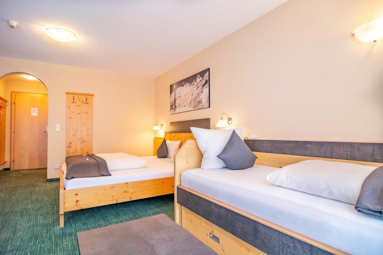 Hotel Garni Alpenhof Ишгль Экстерьер фото