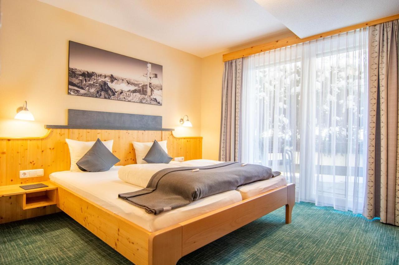 Hotel Garni Alpenhof Ишгль Экстерьер фото